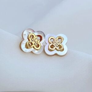 Tory Burch stud earrings Elegant Gold and White Floral Earrings